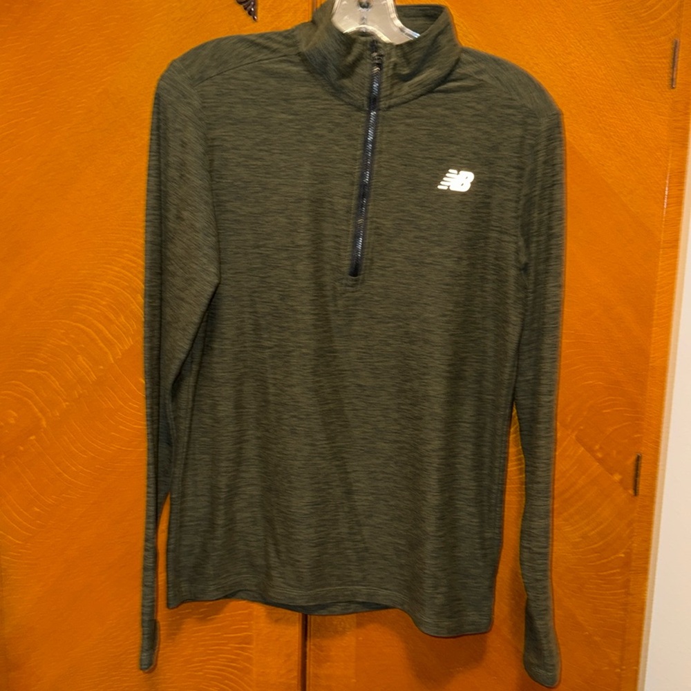 New Balance men’s long sleeve zip up top.  Size S